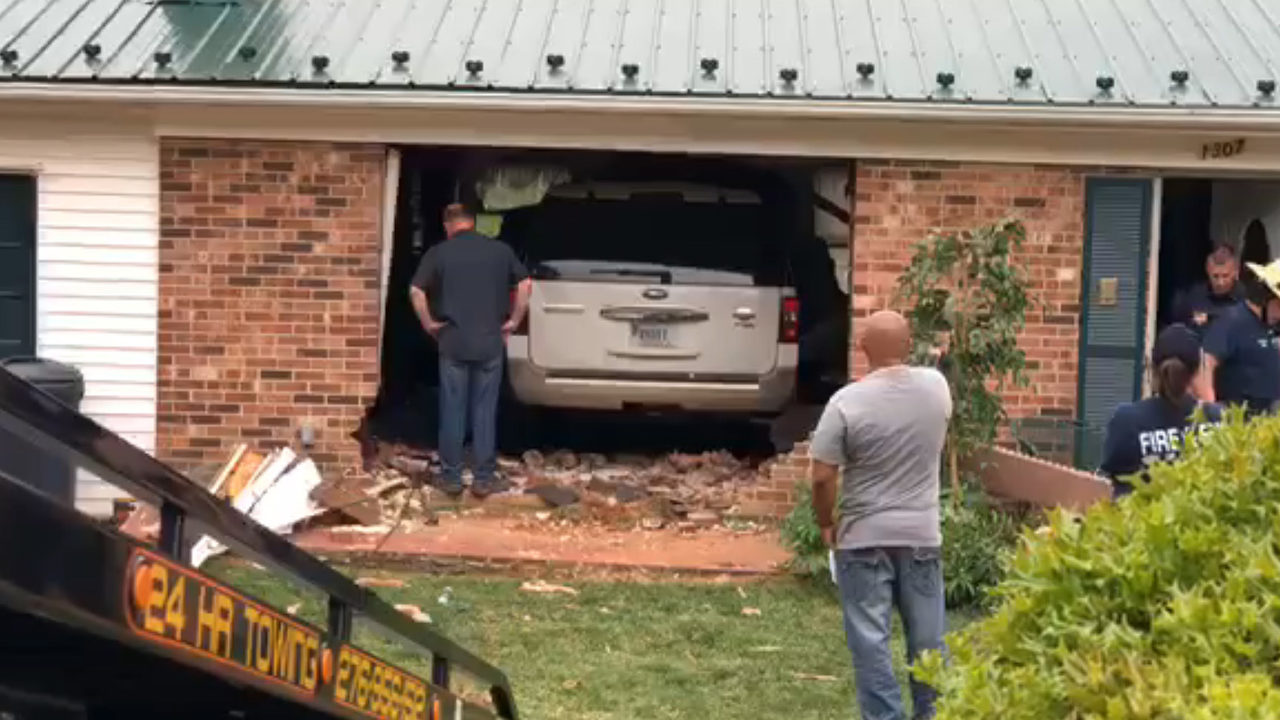 SUV crashes into Martinsville house
